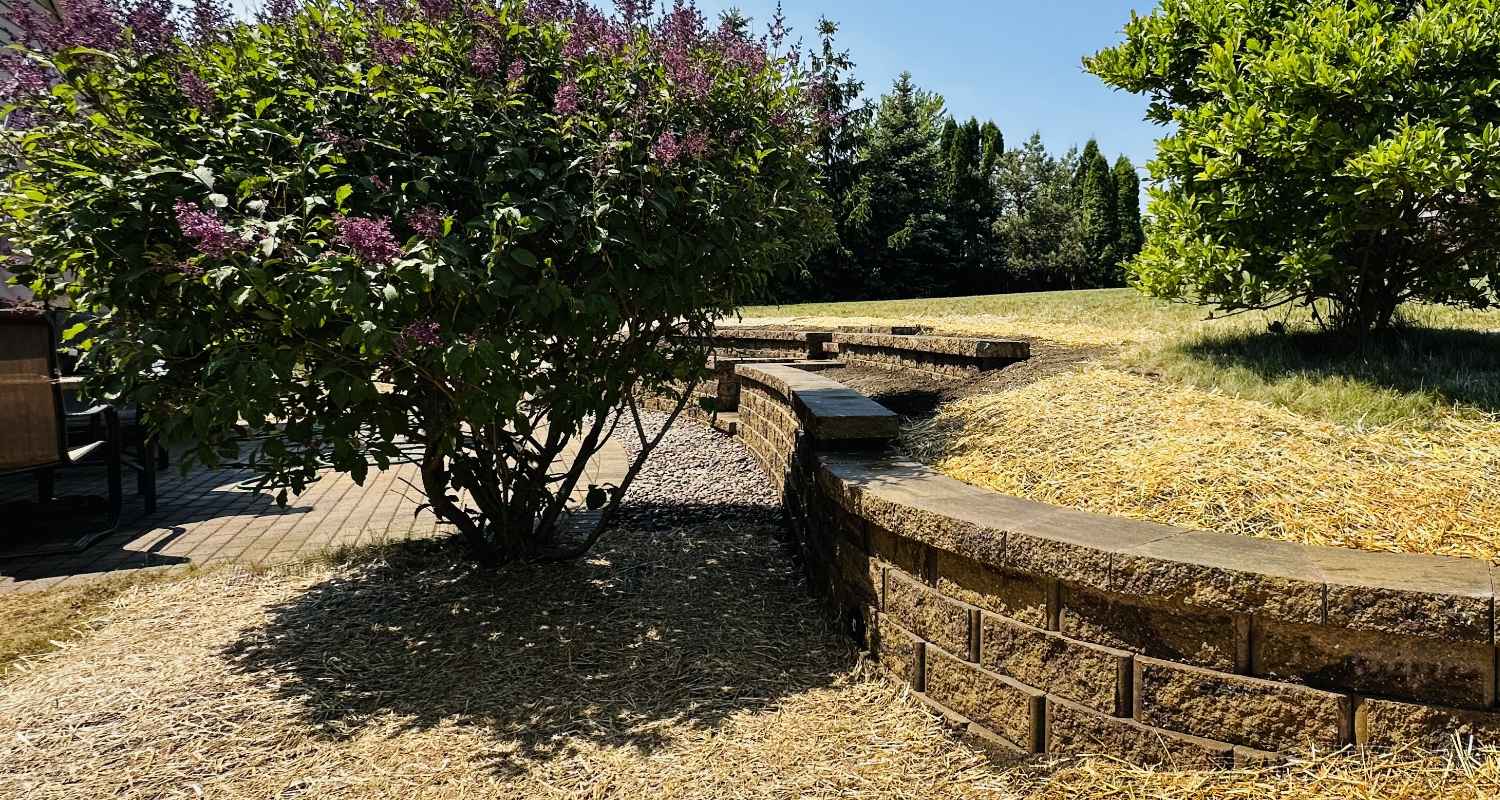 View of finished patio and fireplace.