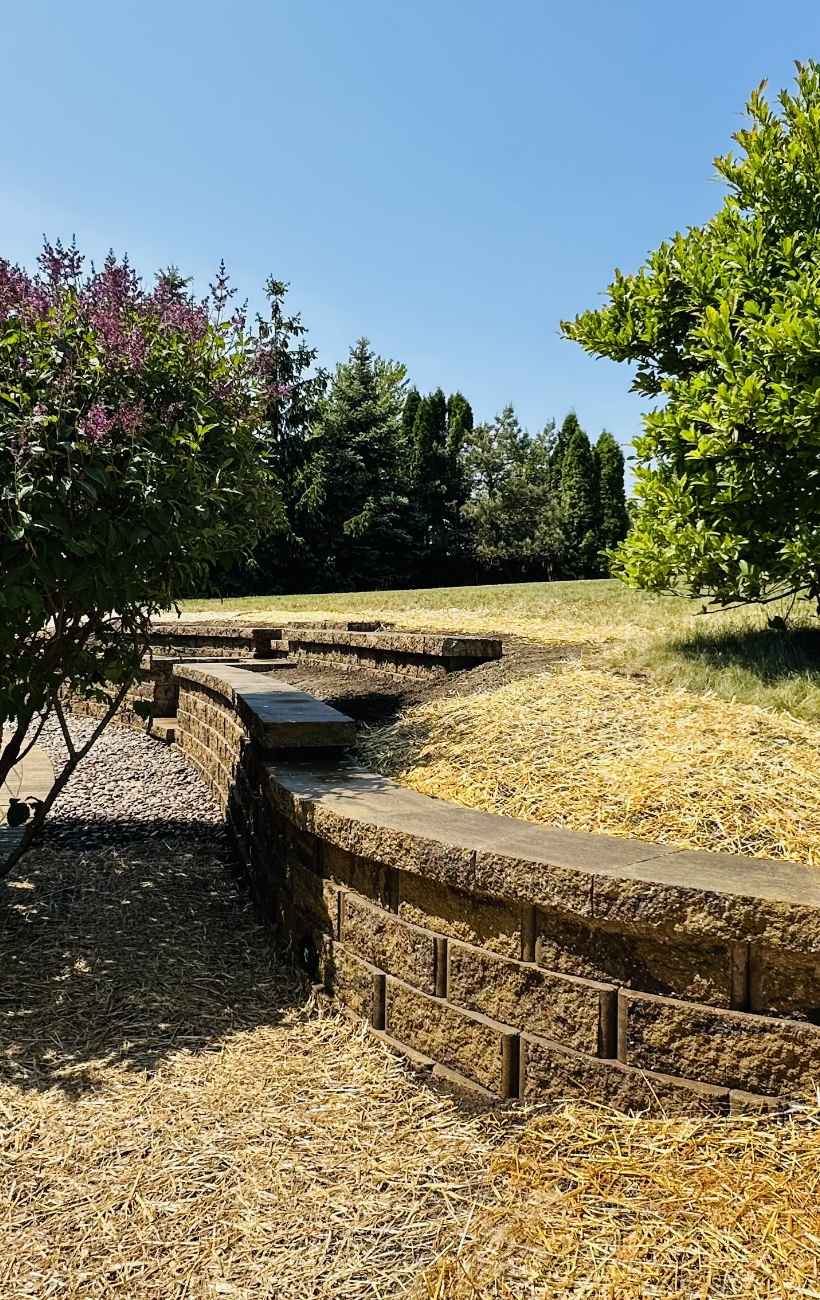 View of finished patio and fireplace.