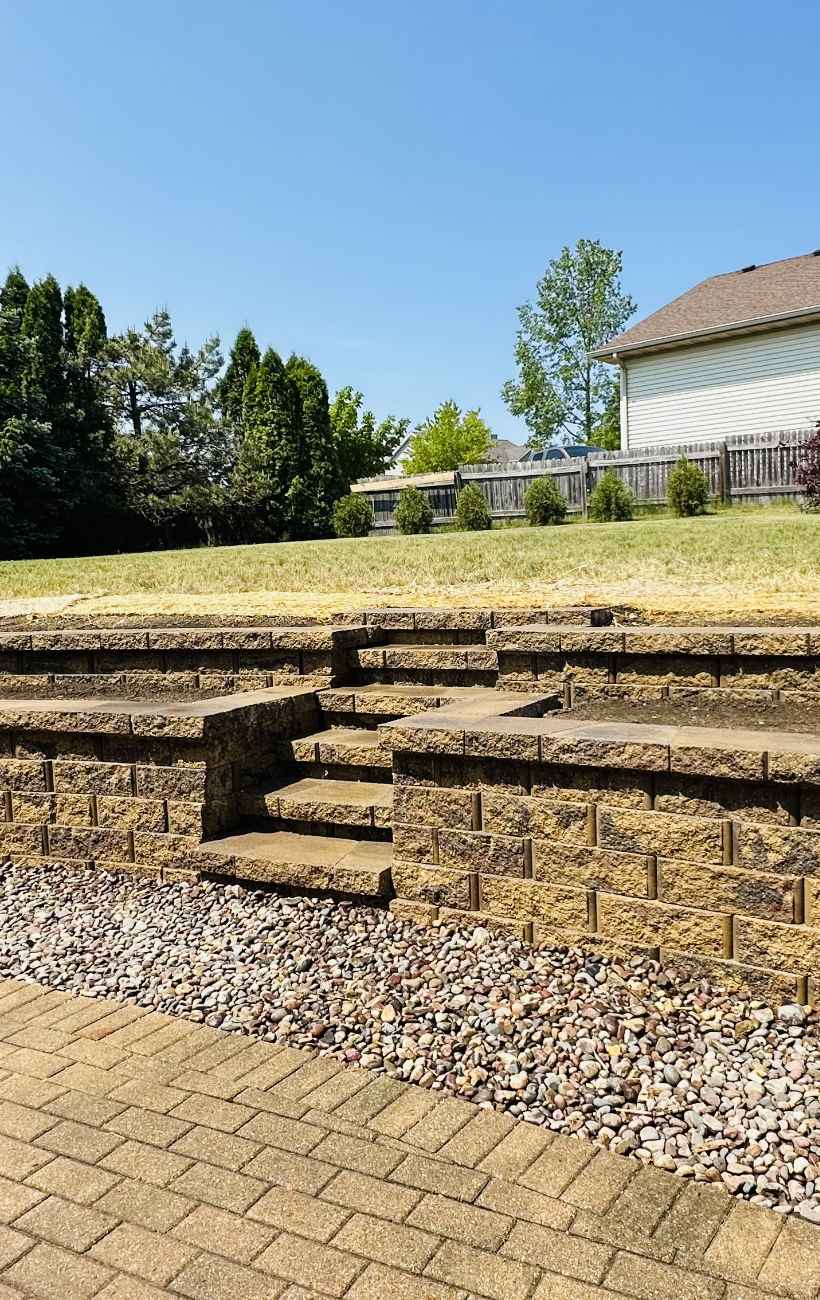 View of finished patio and fireplace.