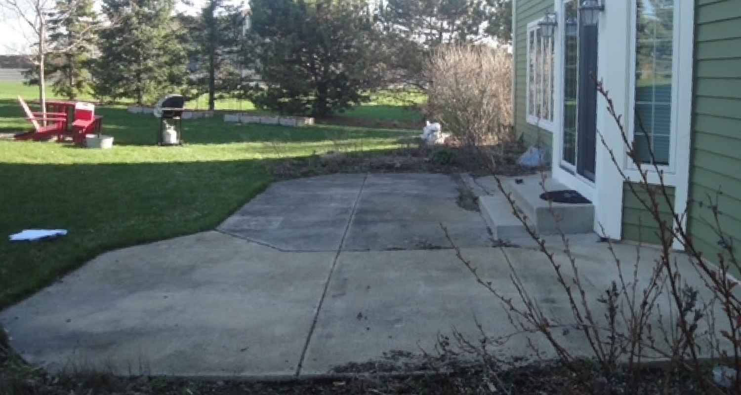 Prepping the land for gravel and stone.