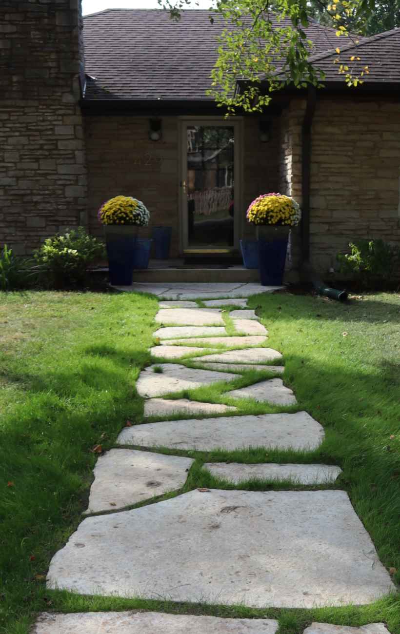 View of finished patio and fireplace.