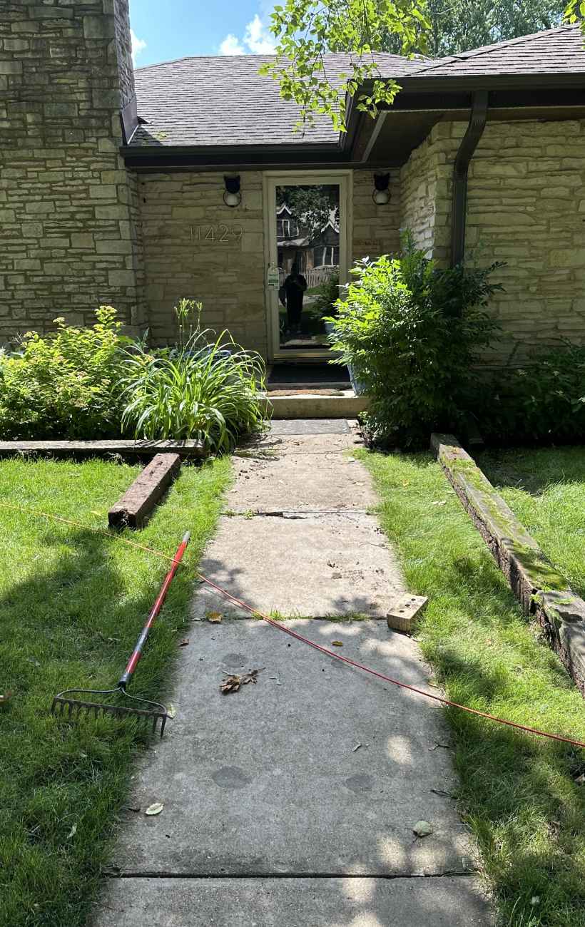 Prepping the land for gravel and stone.