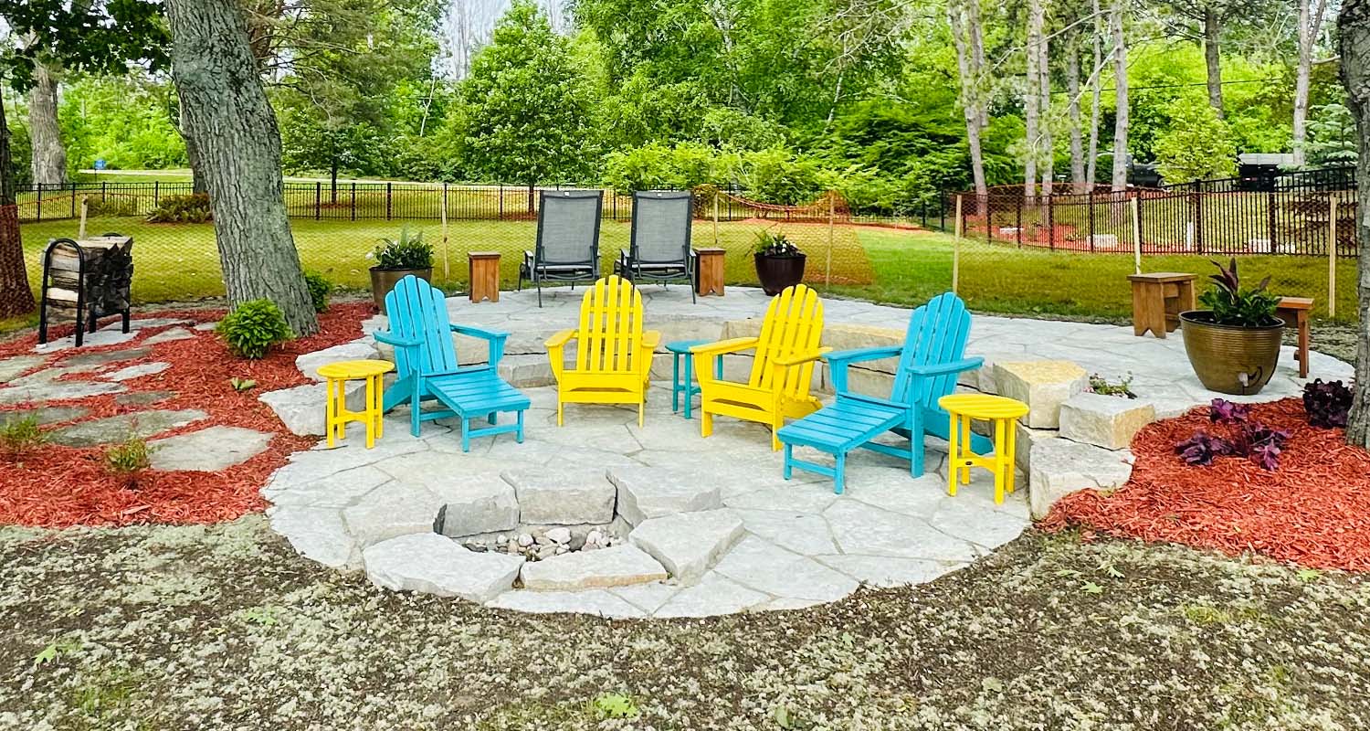 View of finished patio and fireplace.