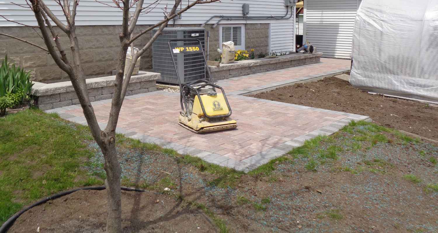 View of finished patio and fireplace.