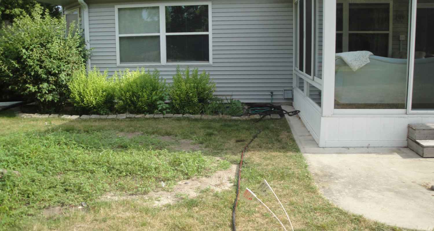 Prepping the land for gravel and stone.