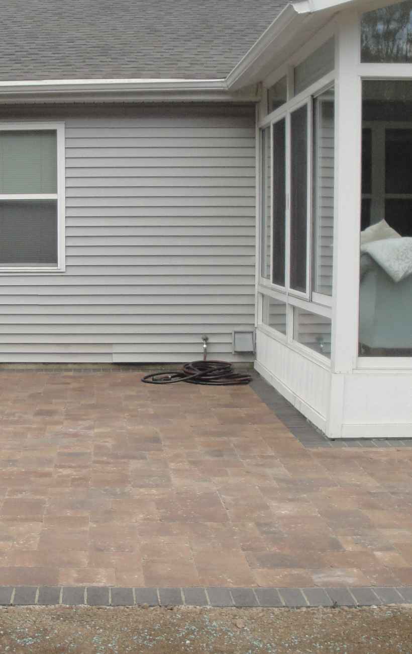View of finished patio and fireplace.