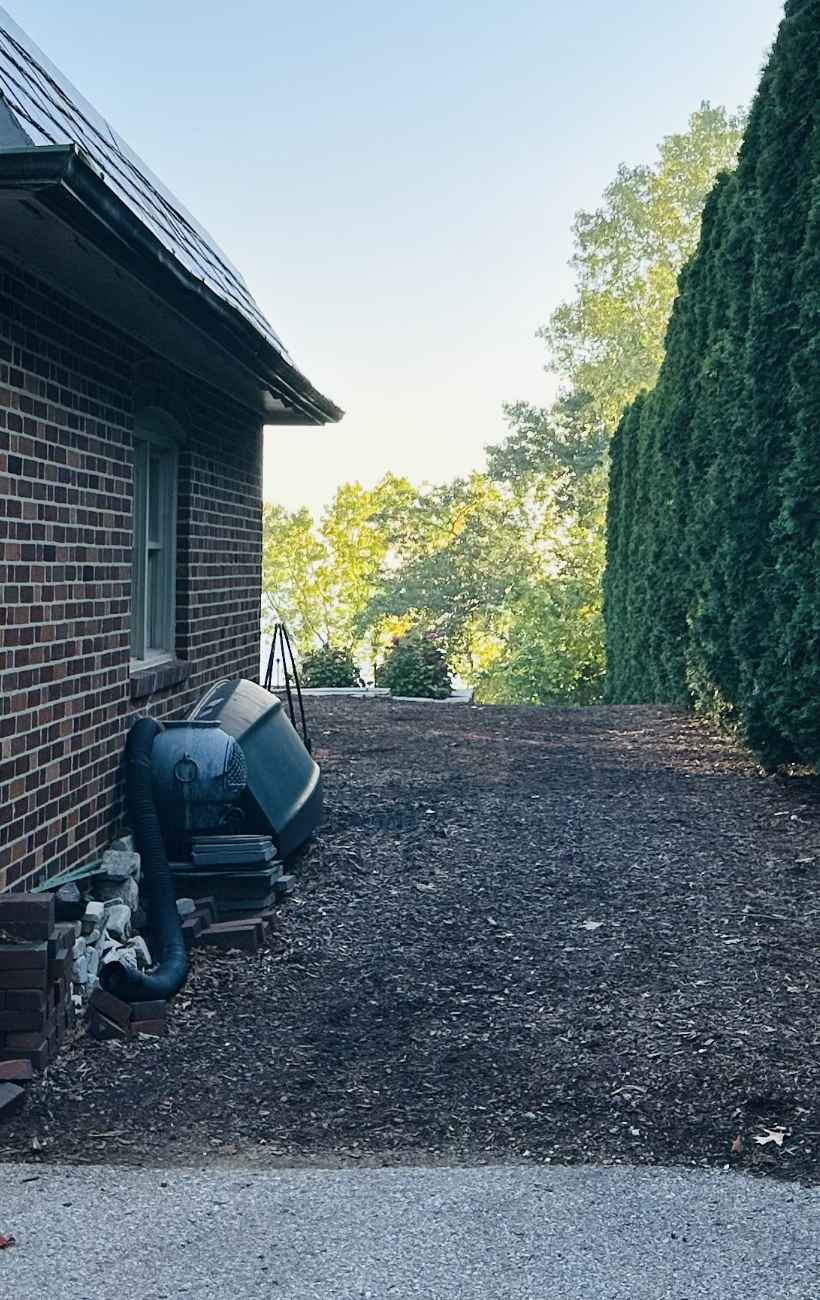 Prepping the land for gravel and stone.