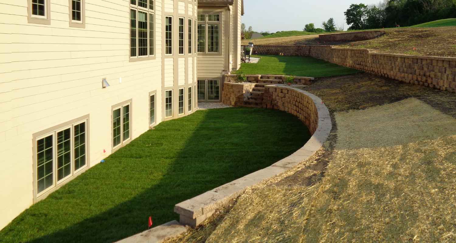 View of finished patio and fireplace.