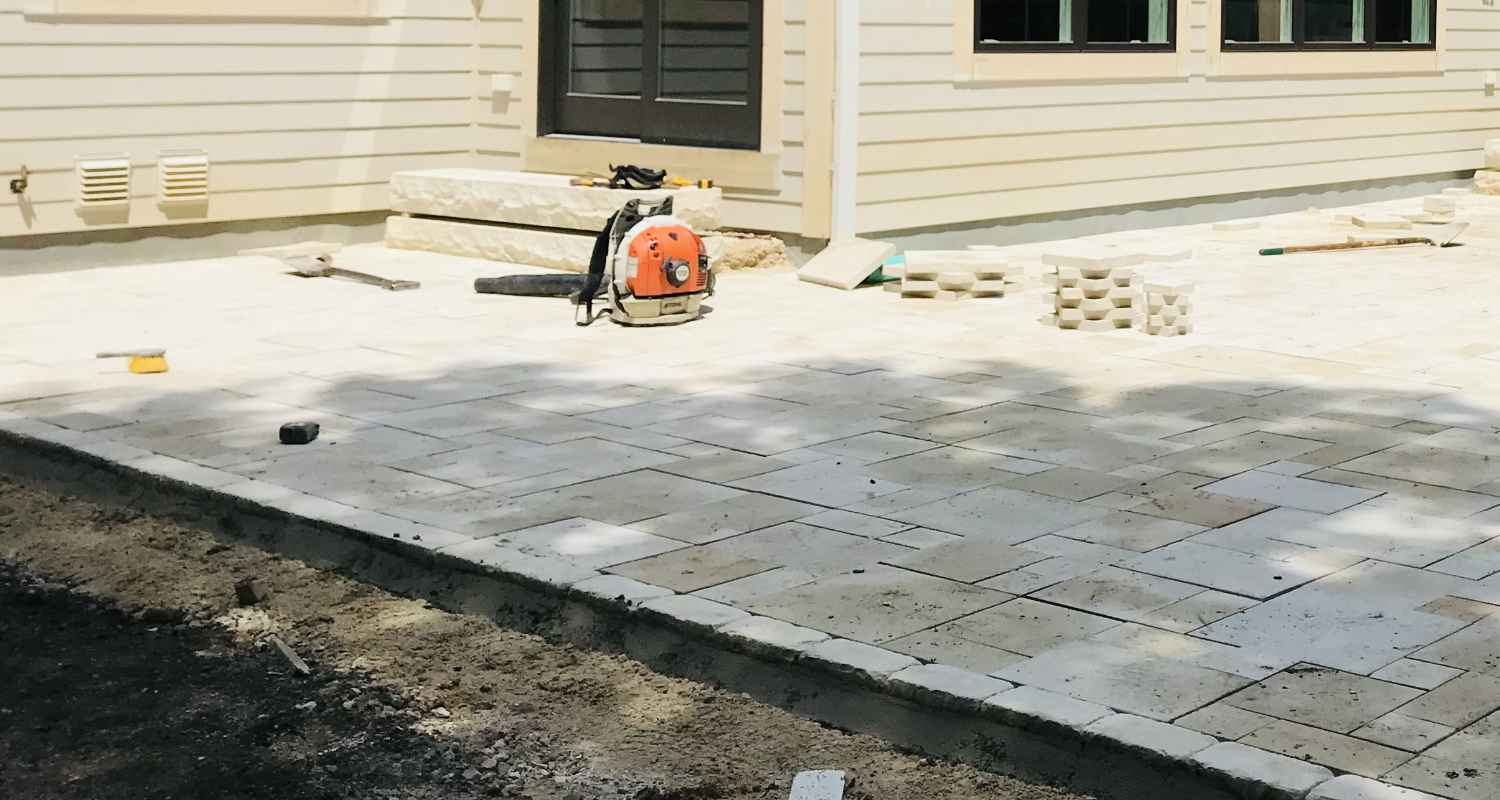 View of finished patio and fireplace.